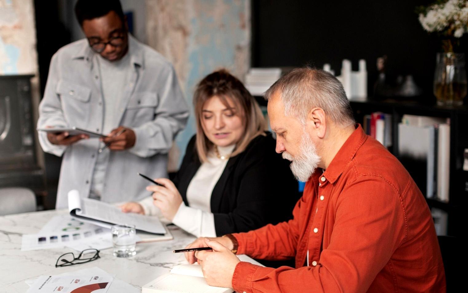 Students engaged in interactive investment learning session with market analysis tools